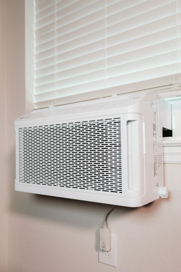 Crafting Captivating Headlines: Your awesome post title goes here Wall-mounted air conditioner installed in a residential setting, providing cooling comfort.